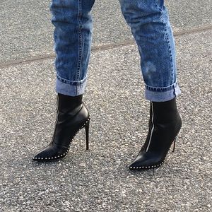Black zip up heeled booties